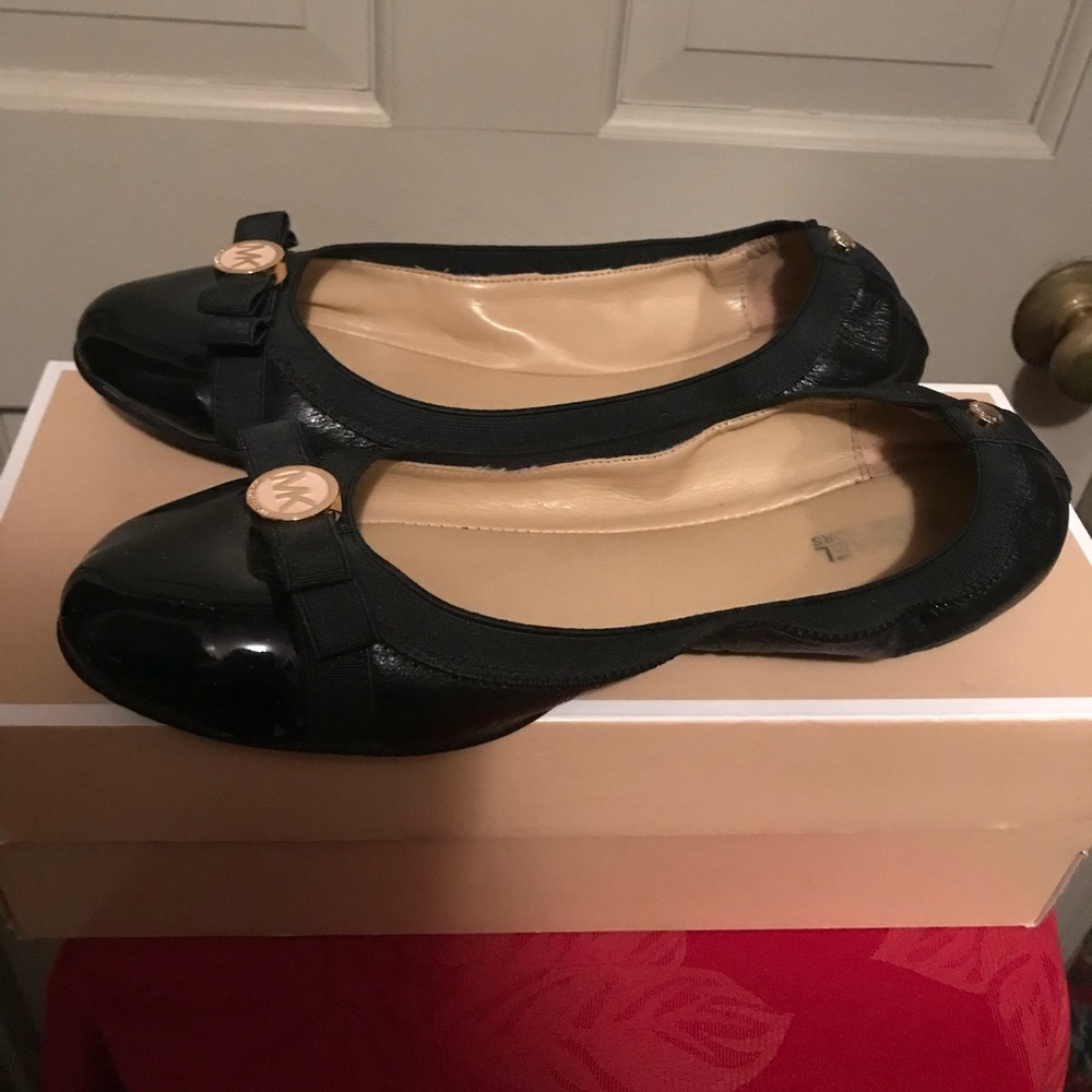 Michael Kors black ballerina flats  size 38 in box .